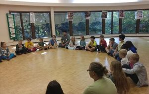 children sitting in circle